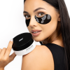 Model with collagen eye patches applied