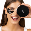 Model with collagen eye patches applied